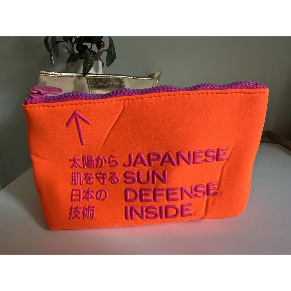 Shiseido Ginza Tokyo Cosmetic Bag Set- Neon Orange & Gold Pouches